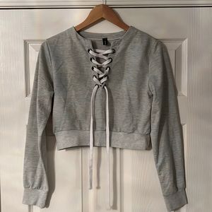 Long sleeve crop top lace up top